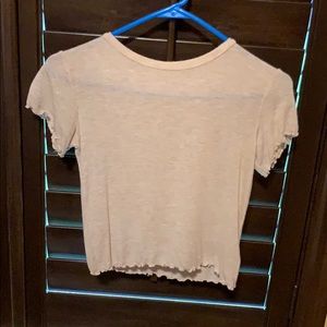 Tight fitting nude top